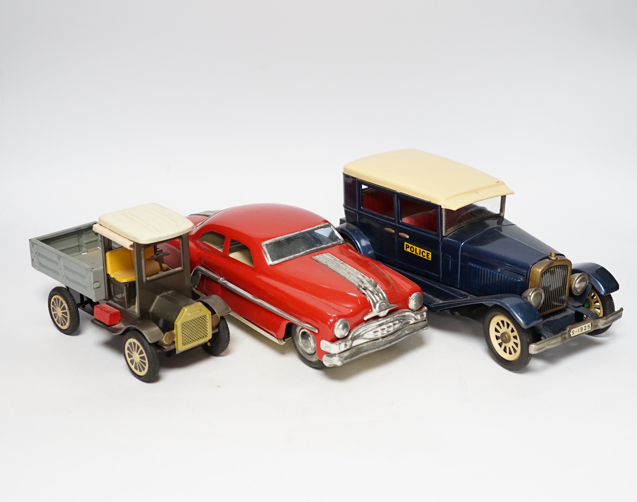 Eight Tinplate cars including; five Minister Deluxe Pontiac tinplate friction drive cars by Amar Toys, India, plus three others